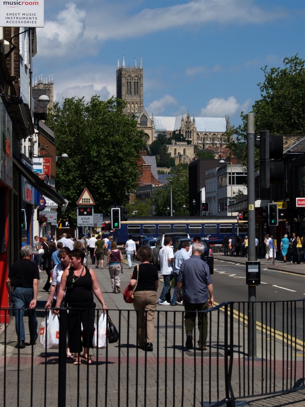 Railcar passes below the cathedral
